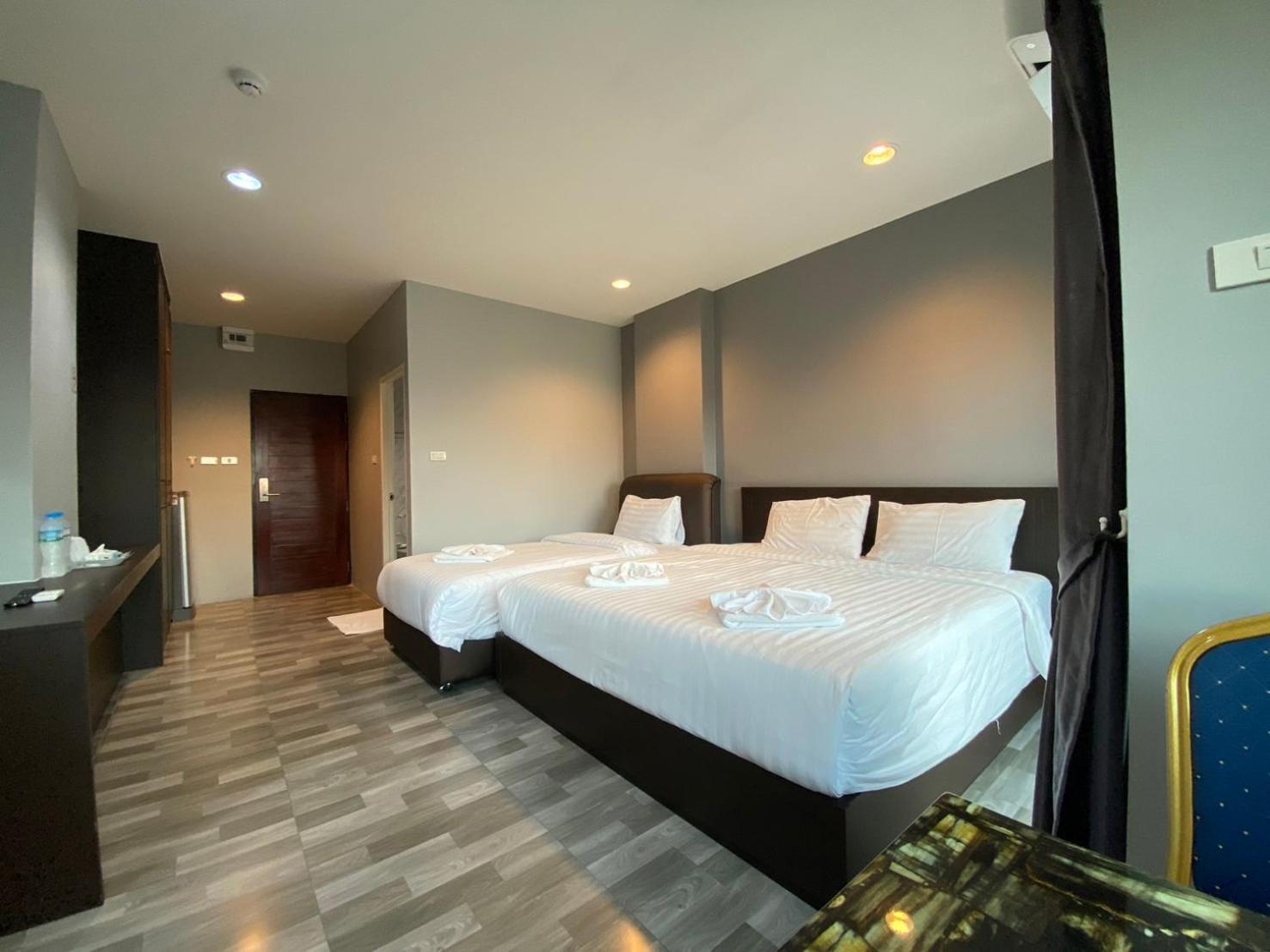 Grand Inter Hotel Samut Sakhon Pokoj fotografie